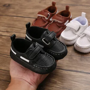 Detailansicht der weichen Baby-Lederschuhe mit Softsohle in Schwarz, Braun und Weiß