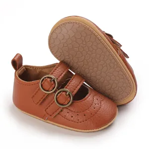 Detailed view of brown baby princess shoes featuring a non-slip soft sole and buckle straps
