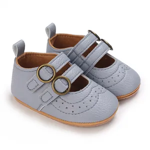 Detailed view of light blue baby walker shoes with double buckle design