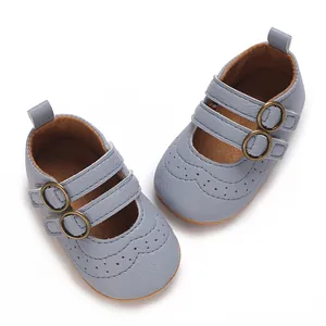 Soft sole baby walking shoes in light blue with elegant scalloped brogue detailing