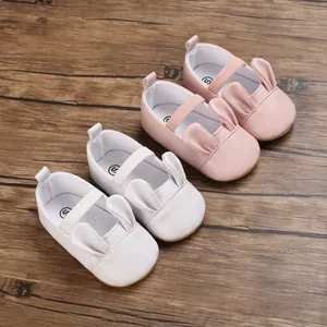 Adorable pink and white baby walker shoes with cute rabbit ear design for infants