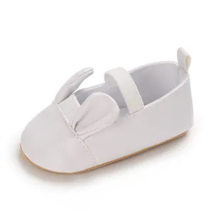 White baby walking shoe with soft sole and cute 3D bunny ears decoration for infant girls