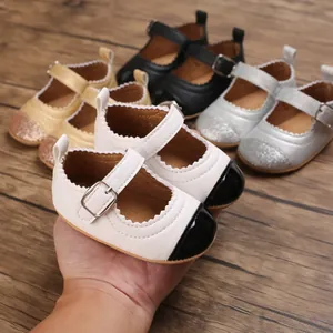 Close-up detail of multi-color baby girl walking shoes with soft non-slip soles.