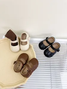 Three pairs of toddler soft sole Mary Jane leather shoes in beige, brown, and black variants.