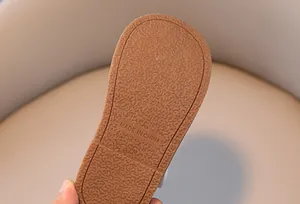 Detail view of anti-slip soft rubber sole for kids toddler shoes with size marking
