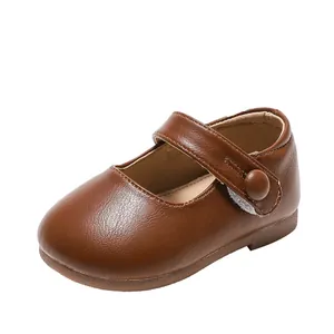 Classic brown leather Mary Jane baby shoes with soft soles for toddlers