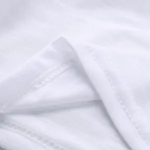 Macro view showing the high-quality stitching and fabric texture of the white jumpsuit