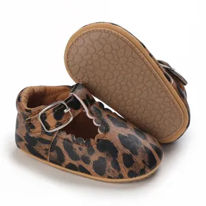 Detailed view of leopard print baby walking shoes with soft non-slip rubber soles