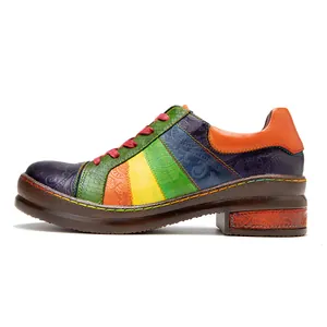Side view of handmade colorful patchwork leather women shoes with embossed patterns