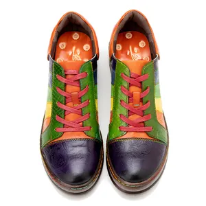 Top down view of premium handmade colorful patchwork leather women shoes with vibrant stitching