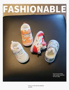Detailed close-up showing fleece-lined toddler winter shoes with colorful patterns