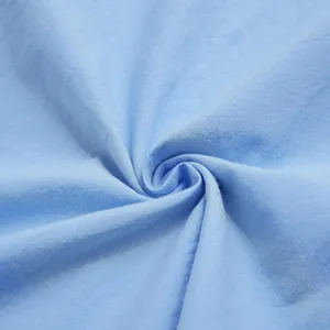 Macro view of soft light blue solid fabric texture for comfortable men's nightwear