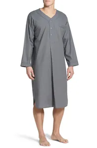 Detailed view of men's loose grey long-sleeved nightshirt with buttoned V-neckline