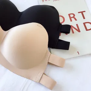 Close-up of seamless strapless push-up bras showing smooth texture and scalloped edges