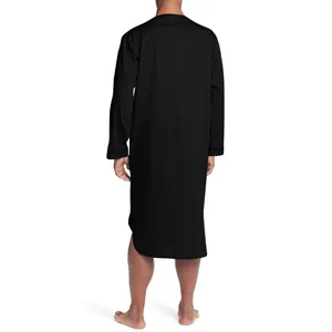Back view of a men's loose black long-sleeved nightshirt for comfortable lounging