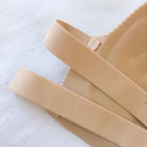 Detailed close-up view of nude strapless push-up bra elastic band for wedding dress.