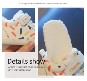 Detailed macro view showing thick white fleece lining and colorful pattern on baby winter shoes