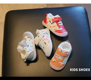 Warm winter toddler walking shoes with fleece lining and vibrant colorful stripes