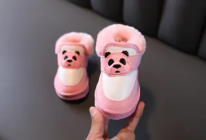 Detail view of pink toddler snow boots with cute panda design and warm fur lining