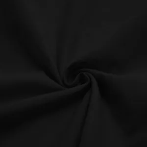 Detailed macro view of soft black fabric texture for men's loose comfortable bathrobe