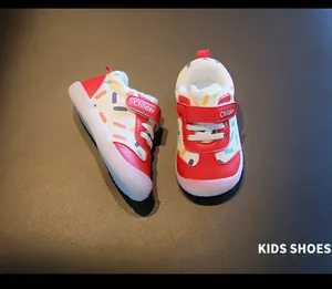 Top-down view of red fleece-lined toddler winter shoes with sprinkle pattern