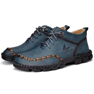 Blue hand-stitched leather mid-top work boots for men with casual outdoor design