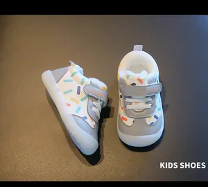Detailed view of plush-lined winter toddler shoes with colorful sprinkle patterns
