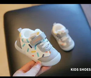 Detailed close-up of warm winter toddler shoes with plush lining and velcro strap.