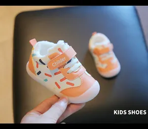 Close-up of warm winter baby walking shoes with soft fleece lining and velcro strap.