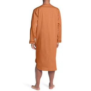 Rear view of a men's long-sleeve orange ethnic style kaftan nightgown for lounging.