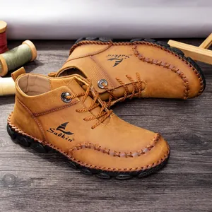 Men's handmade stitched mid-top Martin boots in tan brown for a casual outdoor style