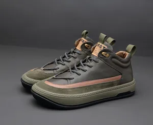 Side view of olive green high-top men's leather sneakers with premium suede panels