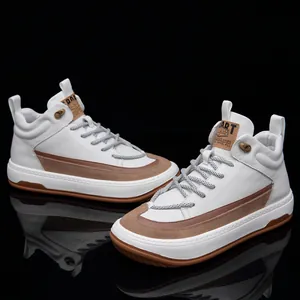 Detailed view of white high-top leather sneakers with unique rounded toe design