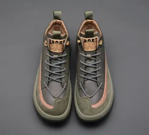 Top-down view of men's olive green leather high-top casual shoes with round toe box.