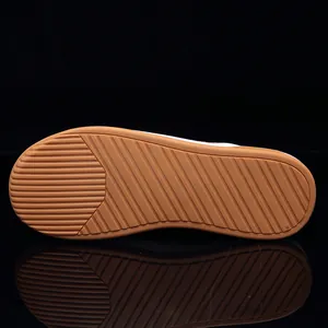 Macro view of the brown rubber anti-slip sole texture of Japanese style leather sneakers