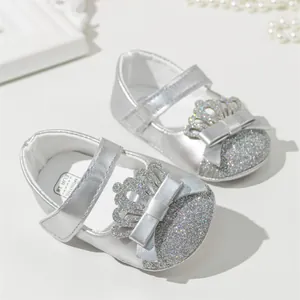 Silver glitter princess baby shoes with crown bow detail and anti-slip soft soles