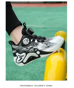 Detail of boys' mid-top basketball shoe with rotating buckle and flame pattern