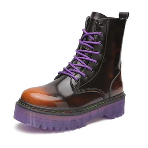 Glossy brown women's Martin boots with vibrant purple laces and thick translucent soles