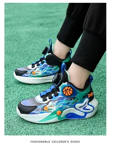 Detailed view of kids' athletic basketball shoes with rotating buckle and flame patterns.