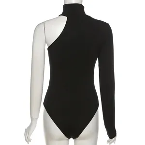 Back view of a black one-shoulder long-sleeve ribbed knit bodysuit on a mannequin.