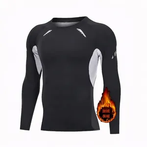 Men's thermal fleece compression shirt detail showing black and grey athletic fabric