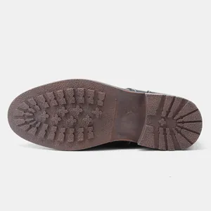 Detalle de la suela de goma antideslizante para botas de invierno de cuero americano