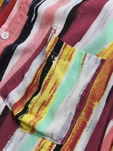 Close-up of vertical colorful striped fabric with chest pocket on men's beach shirt.