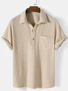 Detail of men's casual waffle knit shirt with lapel collar and chest pocket in beige