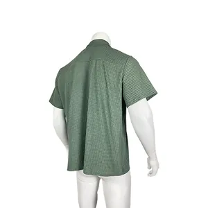 Detailed back view of men's loose casual green checkered short-sleeve shirt on white mannequin