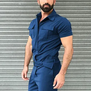 Side view of mens navy blue belted workwear jumpsuit with chest pockets