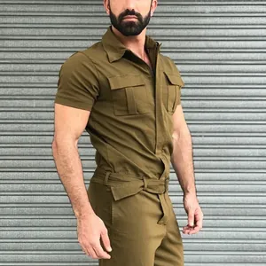 Detail of olive green men's short-sleeved cargo jumpsuit with waist belt and chest pockets.