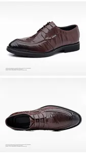 Macro view of men's brown leather dress shoes showing fine texture and stitching.