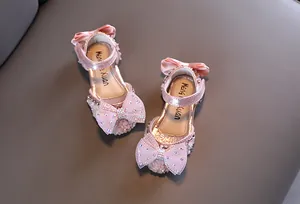 Pink girls' princess sandals with rhinestone bows and soft soles