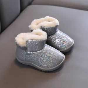 Kids warm winter snow boots with thick faux fur lining and silver glitter pattern